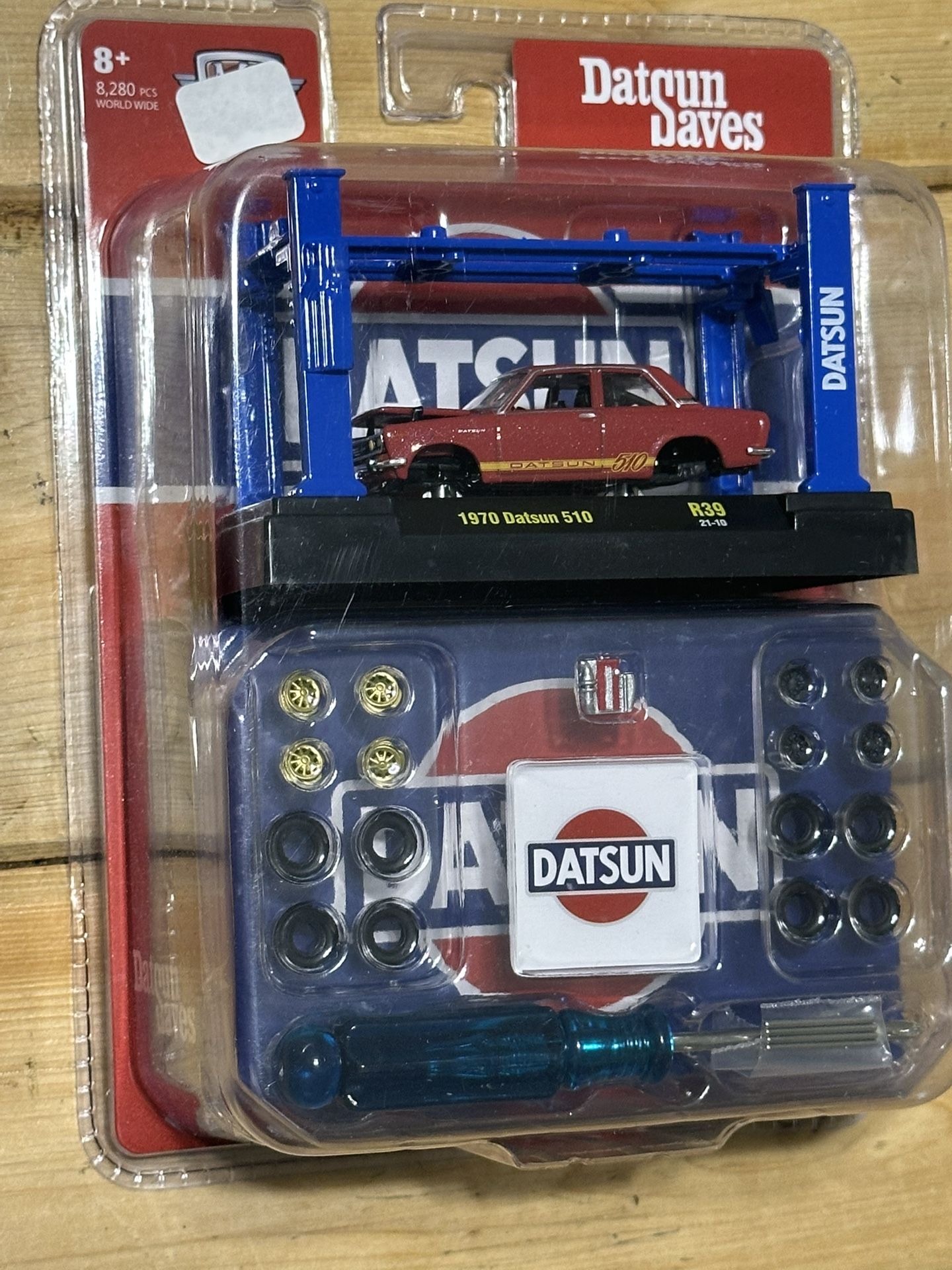 NIB 2021 1970 DATSUN 510 RED JDM SAVES M2 MACHINES MODEL KIT LIFT 1/64 R39 21-10