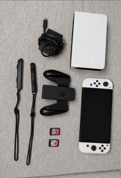 Nintendo Switch OLED Bundle + Mario Kart 8 Deluxe & Super Mario Party
