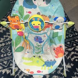 GENTLY USED - Bright Starts Jungle Print Baby Bouncer with Vibration