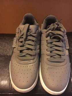 Grey and navy blue Pumas