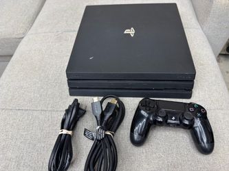 PS4 Pro 1Tb, Madden Game, Controller, and Cables
