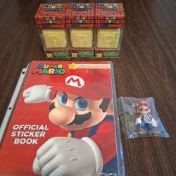 Super Mario sticker book & 3 bath bombs & 1 sealed Mario toy.( New/ Unopened)
