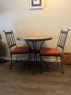 Beautiful mosaic table w/ 2 matching wrought iron chairs