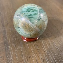 Green calcite sphere with stand