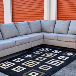 Seccional Ashley Furniture sofa.