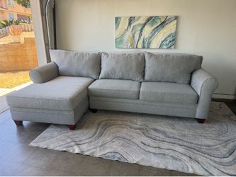 Gray sectional with chaise from Bobs furniture ( Delivery available)