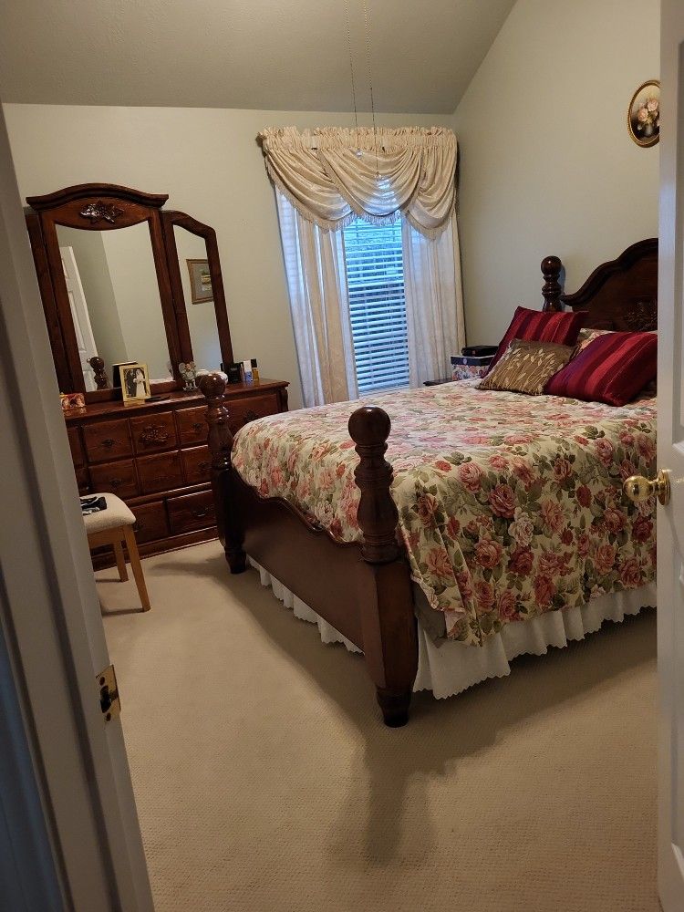 Queen bedroom suite. Included: Dresser, Queen Bed, 2 bedside tables.