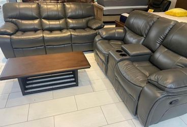 Limited time flash sale. Madrid, gray leather reclining sofa and loveseat set only $1099. Easy finance option and full service delivery available.
