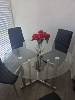 Mesa de comedor .de cristal