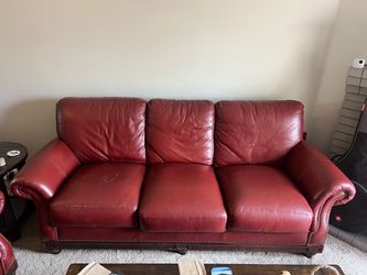 Two beautiful red leather couches