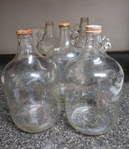 AVAILABLE.: View All Pics  / Details...5  VINTAGE  GLASS  GALLON  JUGS / LIDS 