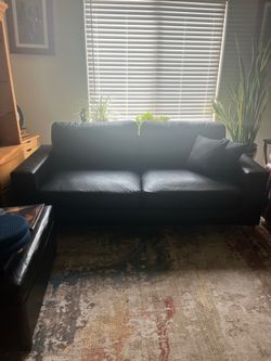 Black leather sofa