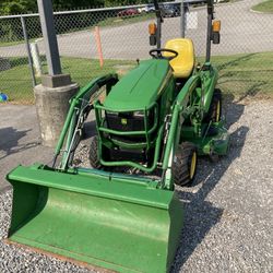 John Deere 1023E Utility Tractor With Loader And Belly Mower 