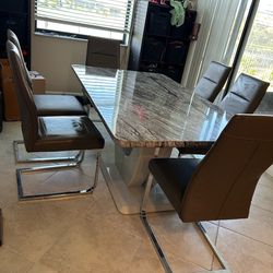 Dining room table and 6 chairs