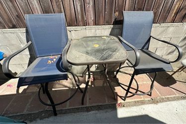 Patio table and two chairs