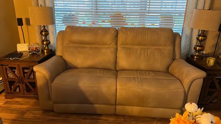 Tan Leather Reclining Loveseat