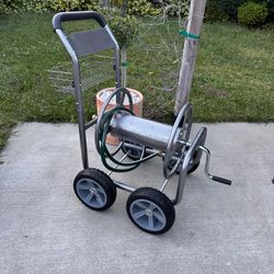 NEW Heavy- duty Garden Hose Reel Cart, with Storage Basket 250 feet capacity
