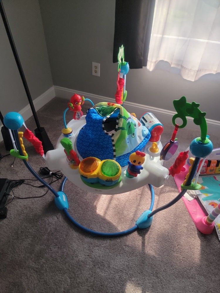 Baby Einstein Neighborhood Symphony Activity Jumper Infant Entertainer with Lights and Melodies