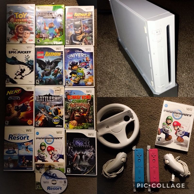 Nintendo Wii + 13 Games, 2 controllers, 2 numb chucks, steering wheel, and Wii Fiit Board