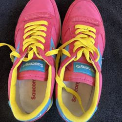 Saucony Jazz Triple model in a bright pink, yellow, and light blue. Women 8