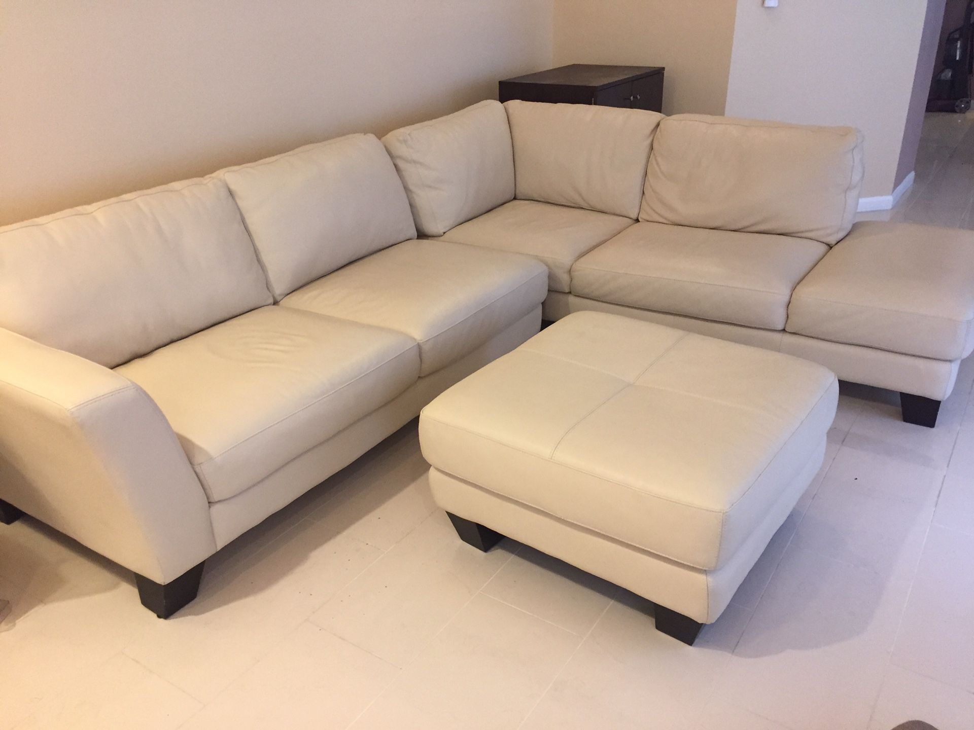 Italian white leather sectional couch and ottoman