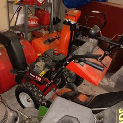 Red snowblower.