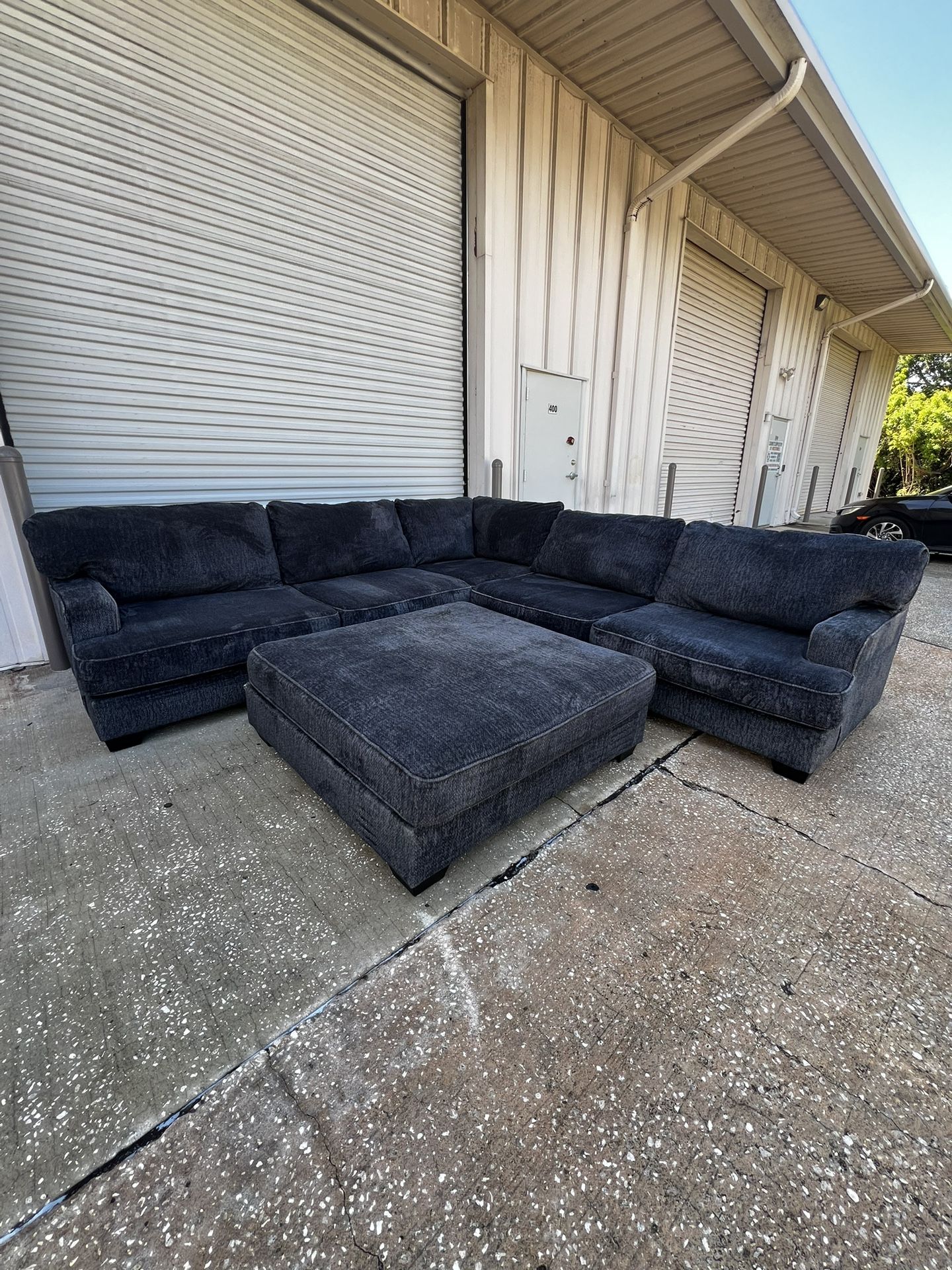 Dark Gray Sectional Couch & Ottoman