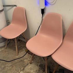 Modern Pink Eames-Style Chairs
