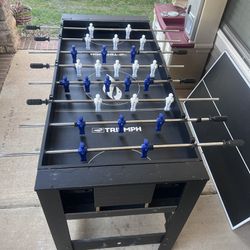 Selling  a complete football table with the option to switch to ping-pong and pool games. 