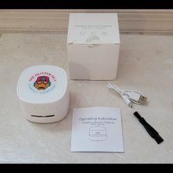 The Glitter Guy Supply Company Desktop Cleaner +Wireless Charging Device. Never Used 