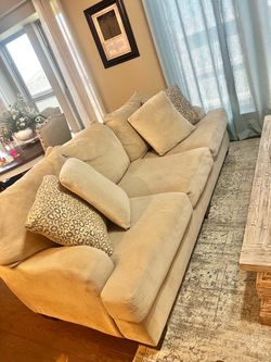 Beige Sofa, Loveseat, and coffee table