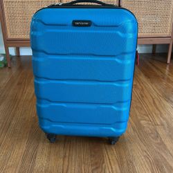 Samsonite Omni PC Hardside Carry-On (20”) – Caribbean Blue