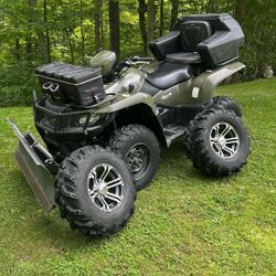 Suzuki ATI 750 4Wheeler 2 Sets Of Tires 4 WD With A Plow  Brand New Battery And Starter Just Serviced Back Seat With Storage Compartment Front Storage