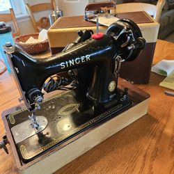 1)Singer Sewing Machine 
