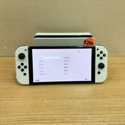 NINTENDO SWITCH OLED CHARGER/HDMI CORDS & TV DOCK INCLUDED