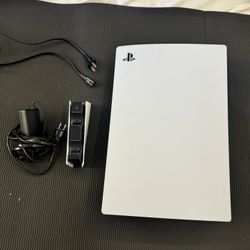 PS5 (Disc) + Charging station.