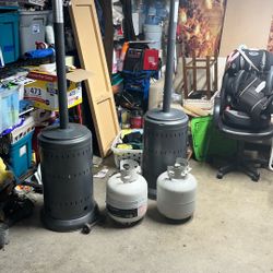 2 Patio Heaters W/ 2 Empty Propane Tanks 