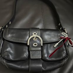 Signature Sufflette leather mini bag Good condition