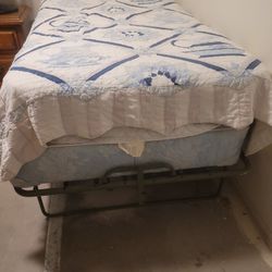 Twin Bed with Mattress on Folding Rollaway Frame