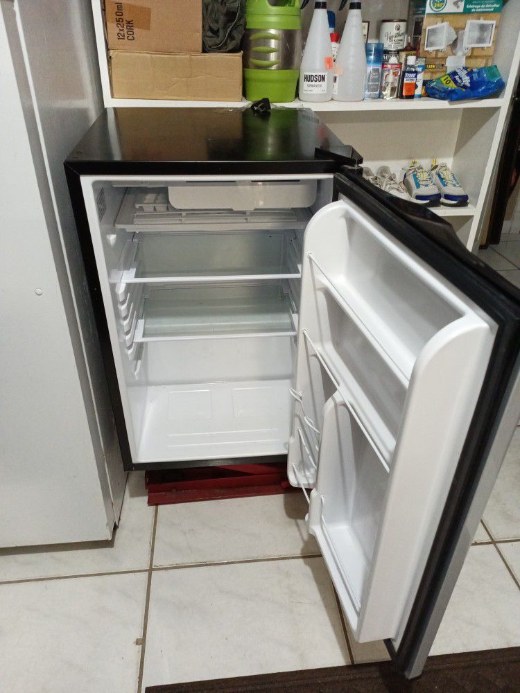 Small. Refrigerator 31" Inches High 20" Inches Long 20 "Inches Dept 