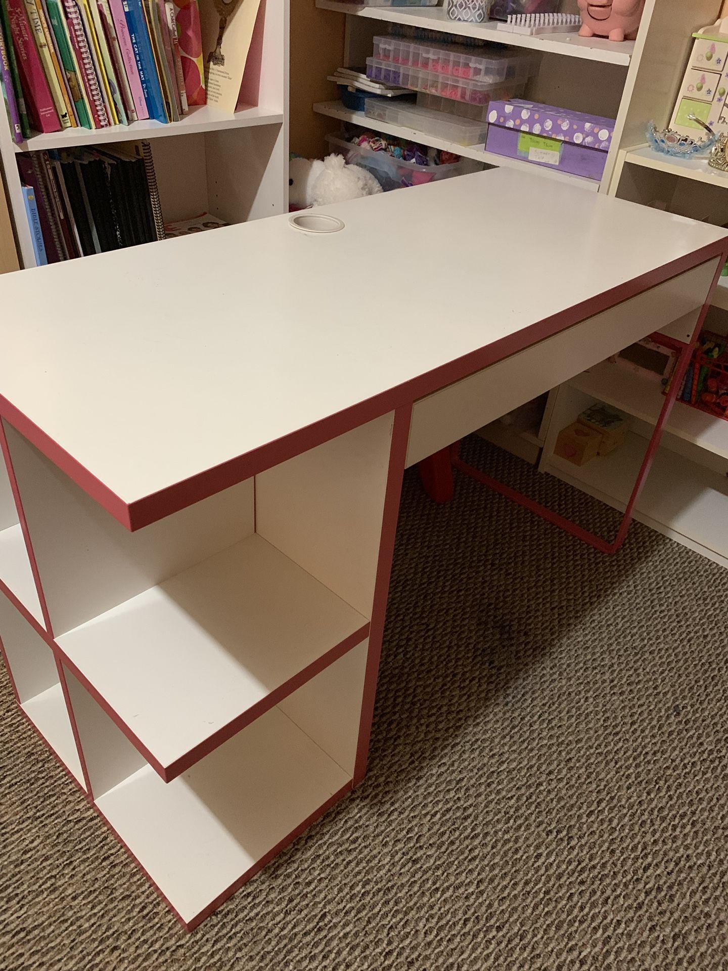 White and light pink computer desk