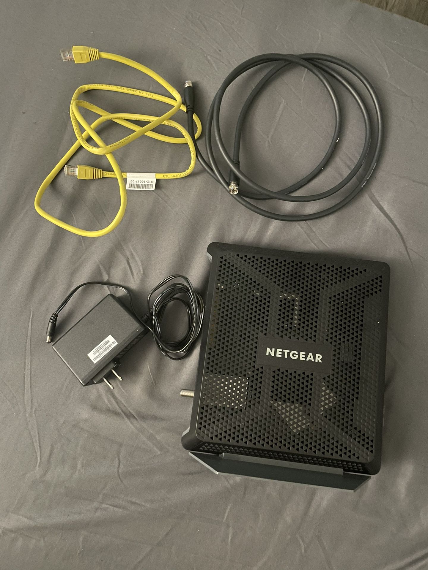 100$ OBO Netgear WiFi Router- modem combo