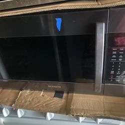 Samsung  microwave over the range new open box 150