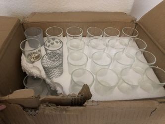 Over 50 small candle holders