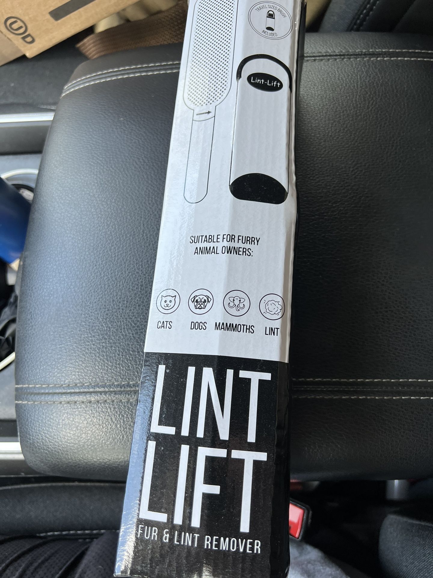 Lint Lift Fur and Lint Remover . Includes A Travel Sized Brush . New in Box