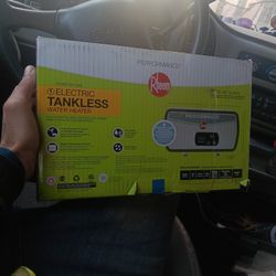 RHEEM ELECTRIC TANKLESS WATER HEATER $175 NEW