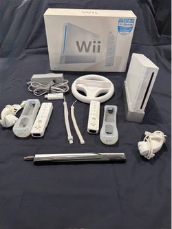Complete Nintendo Wii Bundle with Games , Wheel, 2 Remotes, Region Free + Extras!