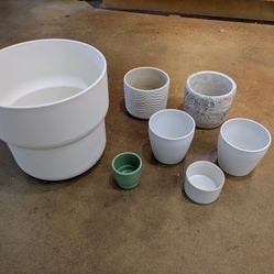 7 Plant Potters ( Different sizes) 
