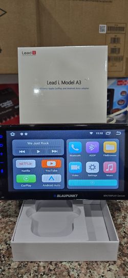 Wireless Apple Carplay AND ANDROID AUTO Adapter With Netflix And YouTube Built-in Watch Videos As You Drive Bypass Built-in. Brand New 