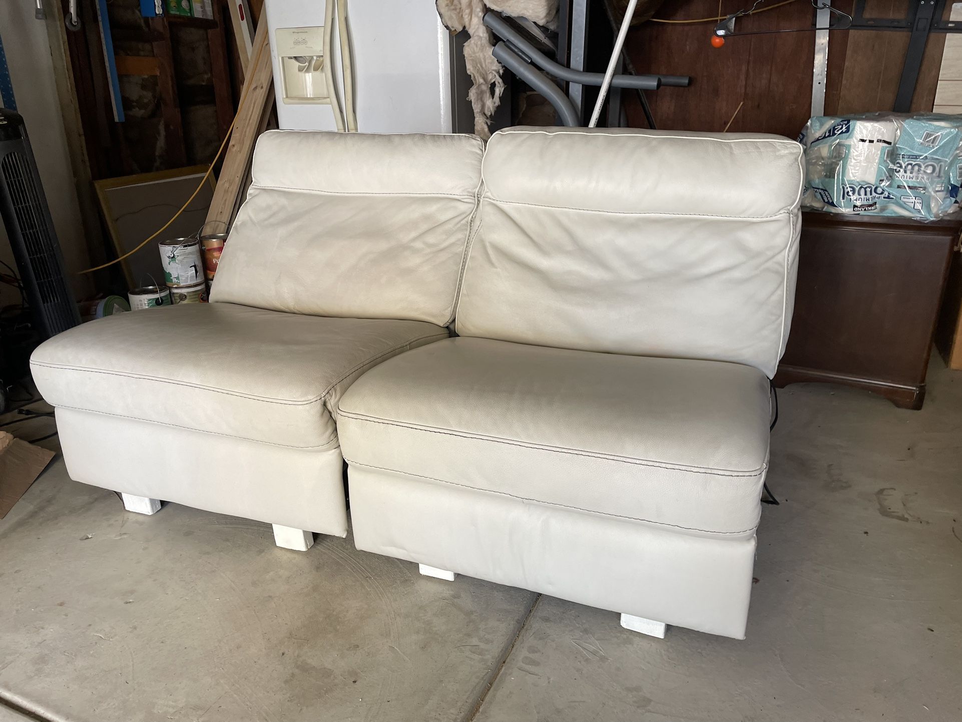 Two White Leather Recliner Chairs